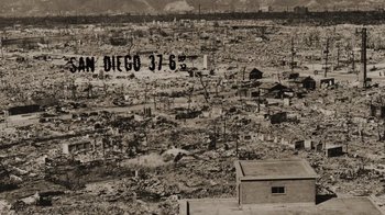 Movie still from “The Fog of War” (2003), directed by Errol Morris – An aerial view of a city that has been devastated by a major earthquake in 1 9 0 6; Extreme Wide shot, High angle