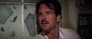 Movie still from “The Fortune” (1975), directed by Mike Nichols – A person with a mustache; Close Up shot, Low angle