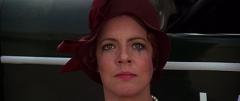 Movie still from “The Fortune” (1975), directed by Mike Nichols – A person wearing a hat; Close Up shot, Low angle