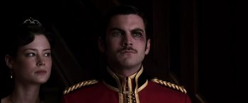 Movie still from “The Four Feathers” (2002), directed by Shekhar Kapur – A person wearing a red and gold uniform; Close Up shot, Low angle