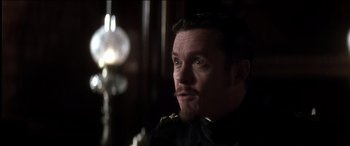 Movie still from “The Four Feathers” (2002), directed by Shekhar Kapur – A person wearing a uniform; Close Up shot, Over the shoulder angle