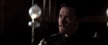 Movie still from “The Four Feathers” (2002), directed by Shekhar Kapur – A person wearing a uniform; Close Up shot, Over the shoulder angle