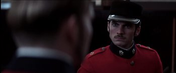 Movie still from “The Four Feathers” (2002), directed by Shekhar Kapur – A person wearing a uniform; Close Up shot, Over the shoulder angle