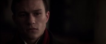 Movie still from “The Four Feathers” (2002), directed by Shekhar Kapur – A person wearing a jacket; Close Up shot, Low angle