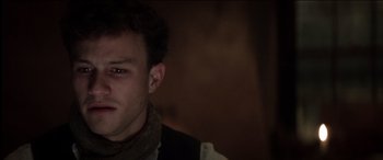 Movie still from “The Four Feathers” (2002), directed by Shekhar Kapur – A young man with dark hair wearing a black shirt; Close Up shot, Low angle