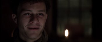 Movie still from “The Four Feathers” (2002), directed by Shekhar Kapur – A man's face in the dark; Close Up shot, Low angle