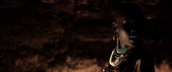 Movie still from “The Four Feathers” (2002), directed by Shekhar Kapur – A woman with a lot of jewelry on her neck; Close Up shot, Low angle