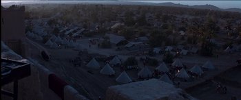 Movie still from “The Four Feathers” (2002), directed by Shekhar Kapur – An aerial view of tents in the desert at night; Extreme Wide shot, High angle
