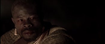 Movie still from “The Four Feathers” (2002), directed by Shekhar Kapur – A person wearing a jacket; Close Up shot, High angle
