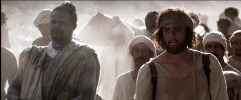 Movie still from “The Four Feathers” (2002), directed by Shekhar Kapur – A group of men standing next to each other; Medium shot, Over the shoulder angle