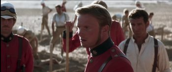 Movie still from “The Four Feathers” (2002), directed by Shekhar Kapur – A person wearing a uniform; Close Up shot, Over the shoulder angle