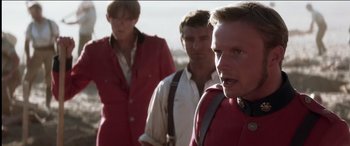 Movie still from “The Four Feathers” (2002), directed by Shekhar Kapur – A group of men standing next to each other on top of a hill; Close Up shot, Over the shoulder angle