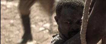 Movie still from “The Four Feathers” (2002), directed by Shekhar Kapur – A person with a beard; Close Up shot, Over the shoulder angle