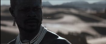 Movie still from “The Four Feathers” (2002), directed by Shekhar Kapur – A man's face in the desert; Close Up shot, Low angle