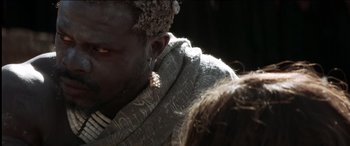 Movie still from “The Four Feathers” (2002), directed by Shekhar Kapur – A man's face in the sunlight; Close Up shot, Over the shoulder angle