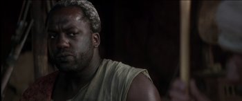 Movie still from “The Four Feathers” (2002), directed by Shekhar Kapur – A person wearing a tank top; Close Up shot, Over the shoulder angle