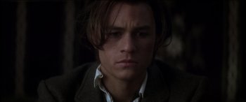 Movie still from “The Four Feathers” (2002), directed by Shekhar Kapur – A person with long hair; Close Up shot, Low angle