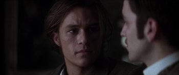 Movie still from “The Four Feathers” (2002), directed by Shekhar Kapur – A person with long hair; Close Up shot, Over the shoulder angle