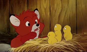 Movie still from “The Fox and the Hound” (1981), directed by Richard Rich – A cartoon of a red fox and some yellow chicks; Close Up shot, Over the shoulder angle