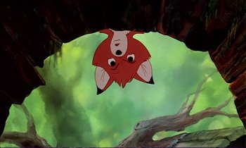 Movie still from “The Fox and the Hound” (1981), directed by Richard Rich – A cartoon picture of a red fox flying through the air; Medium shot, Low angle