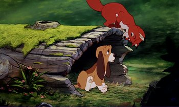 Movie still from “The Fox and the Hound” (1981), directed by Richard Rich – A dog and a fox in a forest; Wide shot, Low angle
