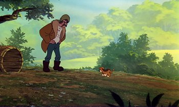 Movie still from “The Fox and the Hound” (1981), directed by Richard Rich – A man standing next to a cat on a field; Wide shot, Low angle