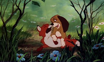Movie still from “The Fox and the Hound” (1981), directed by Richard Rich – A painting of a dog and a fox in the woods; Wide shot, High angle