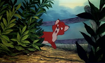 Movie still from “The Fox and the Hound” (1981), directed by Richard Rich – A painting of an animated fox in the woods; Medium shot, Low angle