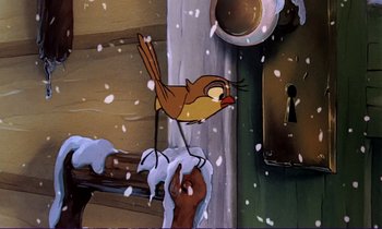 Movie still from “The Fox and the Hound” (1981), directed by Richard Rich – A bird is standing on a branch in the snow; Extreme Close Up shot, Low angle