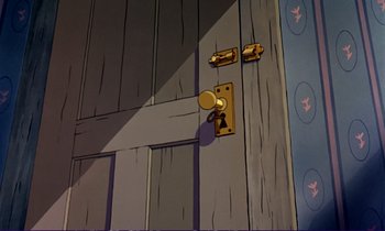 Movie still from “The Fox and the Hound” (1981), directed by Richard Rich – A door handle and lock on the outside of a building; Extreme Close Up shot, High angle