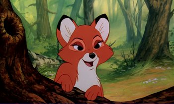 Movie still from “The Fox and the Hound” (1981), directed by Richard Rich – A cartoon picture of a fox sitting on a tree branch; Close Up shot, Over the shoulder angle