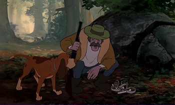Movie still from “The Fox and the Hound” (1981), directed by Richard Rich – An animated scene of a man with a gun and a dog; Medium shot, Low angle