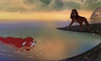 Movie still from “The Fox and the Hound” (1981), directed by Richard Rich – A dog is looking at a fish in a body of water; Wide shot, Low angle