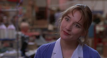 Movie still from “The Full Monty” (1997), directed by Peter Cattaneo – A person wearing a blue sweater; Close Up shot, Over the shoulder angle