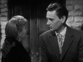 Movie still from “The Furies” (1950), directed by Anthony Mann – A man and a woman talking to each other; Close Up shot, Over the shoulder angle