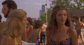 Movie still from “The Fury” (1978), directed by Brian De Palma – Two young women standing next to each other on a sidewalk; Close Up shot, Over the shoulder angle