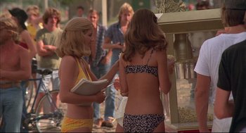 Movie still from “The Fury” (1978), directed by Brian De Palma – Two women in bikinis standing in front of an ice cream machine; Medium shot, High angle