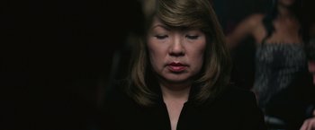 Movie still from “The Gambler” (2014), directed by Rupert Wyatt – A person with her eyes closed; Close Up shot, High angle