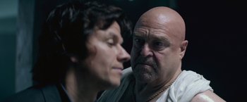 Movie still from “The Gambler” (2014), directed by Rupert Wyatt – A man and a woman looking at each other; Close Up shot, Over the shoulder angle