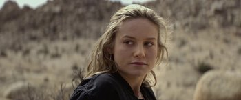 Movie still from “The Gambler” (2014), directed by Rupert Wyatt – A person with long hair; Close Up shot, Over the shoulder angle