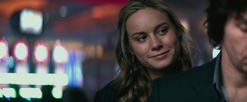 Movie still from “The Gambler” (2014), directed by Rupert Wyatt – A person with long hair; Close Up shot, Over the shoulder angle