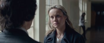 Movie still from “The Gambler” (2014), directed by Rupert Wyatt – A woman is looking at a man in the mirror; Close Up shot, Over the shoulder angle