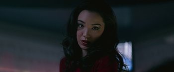 Movie still from “The Gambler” (2014), directed by Rupert Wyatt – A beautiful young woman with long black hair; Close Up shot, Low angle