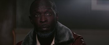 Movie still from “The Gambler” (2014), directed by Rupert Wyatt – A person wearing a jacket; Close Up shot, High angle