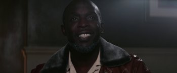 Movie still from “The Gambler” (2014), directed by Rupert Wyatt – A person wearing a leather jacket; Close Up shot, High angle