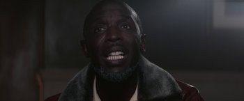 Movie still from “The Gambler” (2014), directed by Rupert Wyatt – A person with a beard; Close Up shot, Low angle