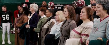 Movie still from “The Game Plan” (2007), directed by Andy Fickman – A group of women standing next to each other in a crowd; Medium shot, High angle
