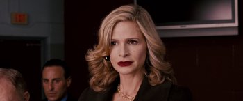 Movie still from “The Game Plan” (2007), directed by Andy Fickman – A person with blonde hair and red lipstick; Close Up shot, Over the shoulder angle