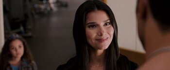 Movie still from “The Game Plan” (2007), directed by Andy Fickman – A person with long black hair; Close Up shot, Over the shoulder angle