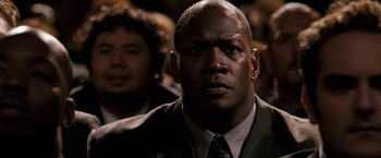 Movie still from “The Game Plan” (2007), directed by Andy Fickman – A man in a suit and a tie; Close Up shot, Low angle